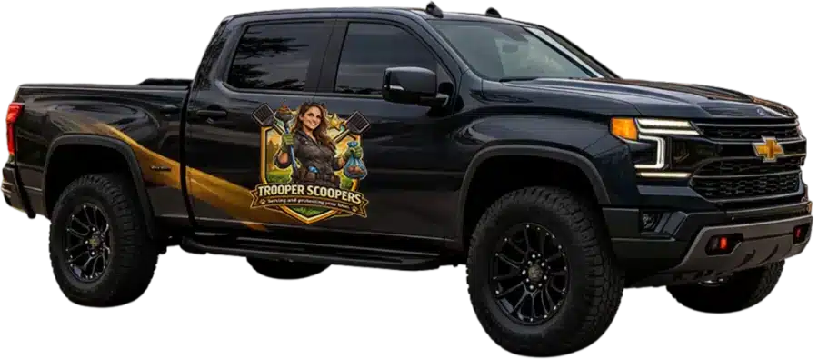 Black Chevrolet pickup with off-road tires and a large Trooper Scoopers door logo depicting a woman holding ice cream scoops.
